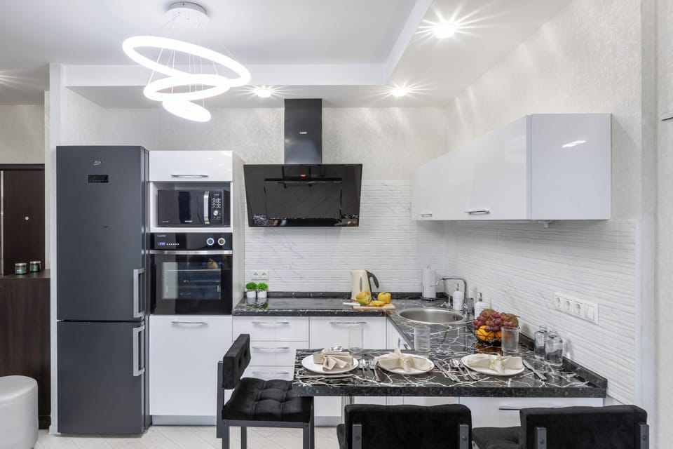 Comfort Apartment, Courtyard View | Private kitchen | Full-size fridge, microwave, oven, stovetop