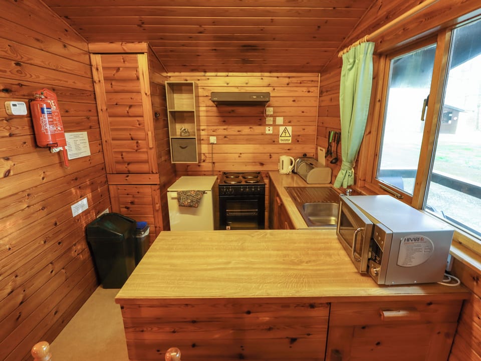 Fridge, microwave, toaster, cookware/dishes/utensils