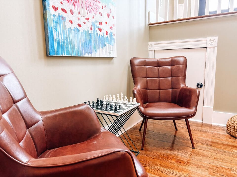 Hallway sitting area with chess board