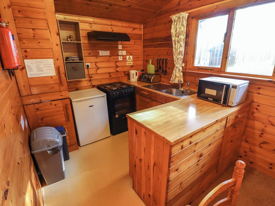 Fridge, microwave, toaster, cookware/dishes/utensils