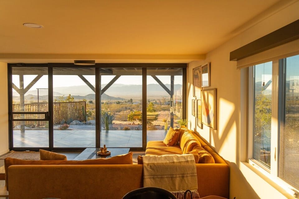 Relax indoors while taking in stunning desert and mountain views.