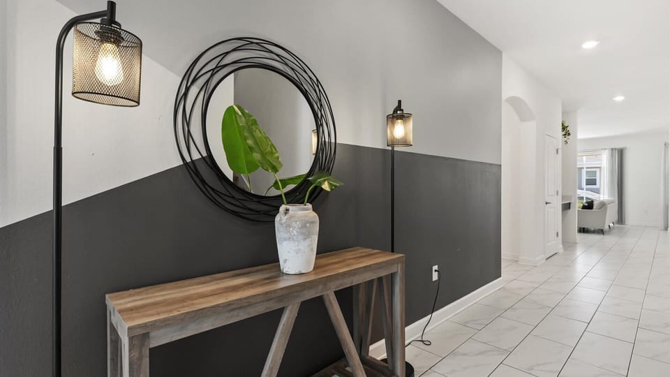 Entryway console with mirror for quick touch ups before heading out