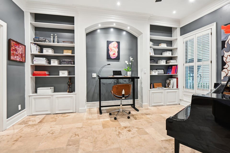 Office with grand piano, room for inflatable beds