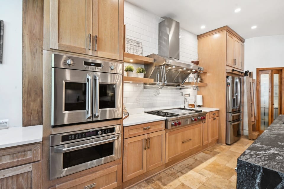 Chefs Kitchen with French door oven, Wolf Cooktop, 2nd oven, warming drawer