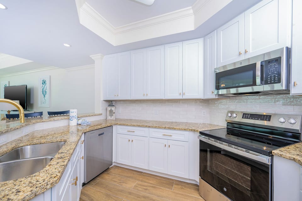 Create delicious meals in the kitchen, where stainless appliances and ample counter space invite culinary creativity