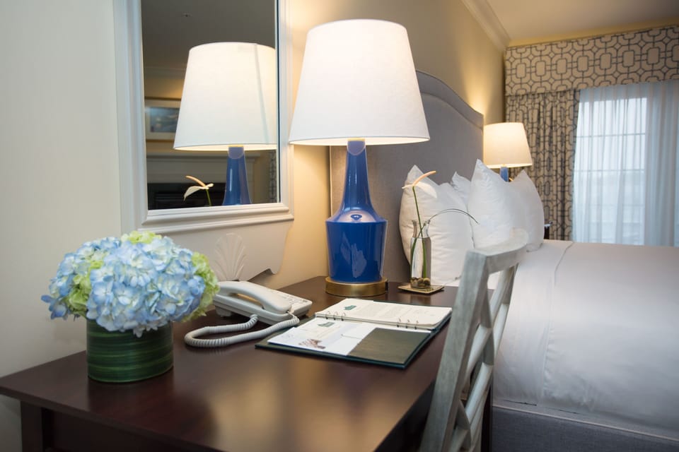 Elegant touches and soft lighting make this workspace a peaceful and inviting retreat.