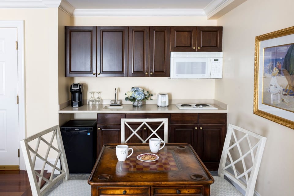 A well-appointed kitchenette offers convenience and charm for a home-away-from-home experience.