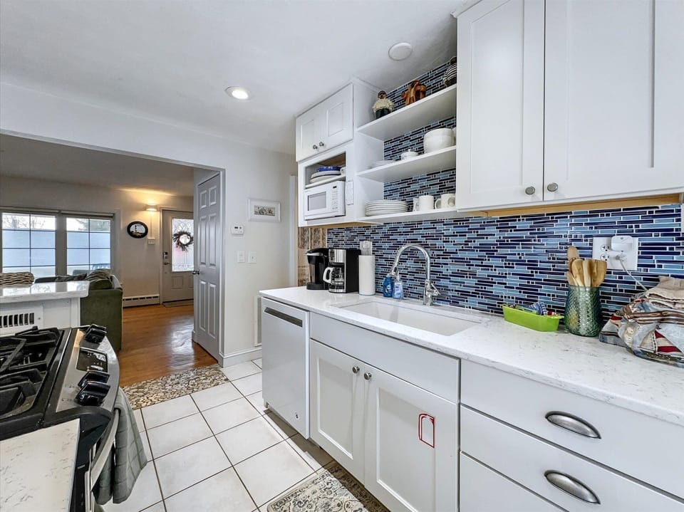 Well-equipped kitchen with stainless steel appliances, perfect for preparing home-cooked meals.