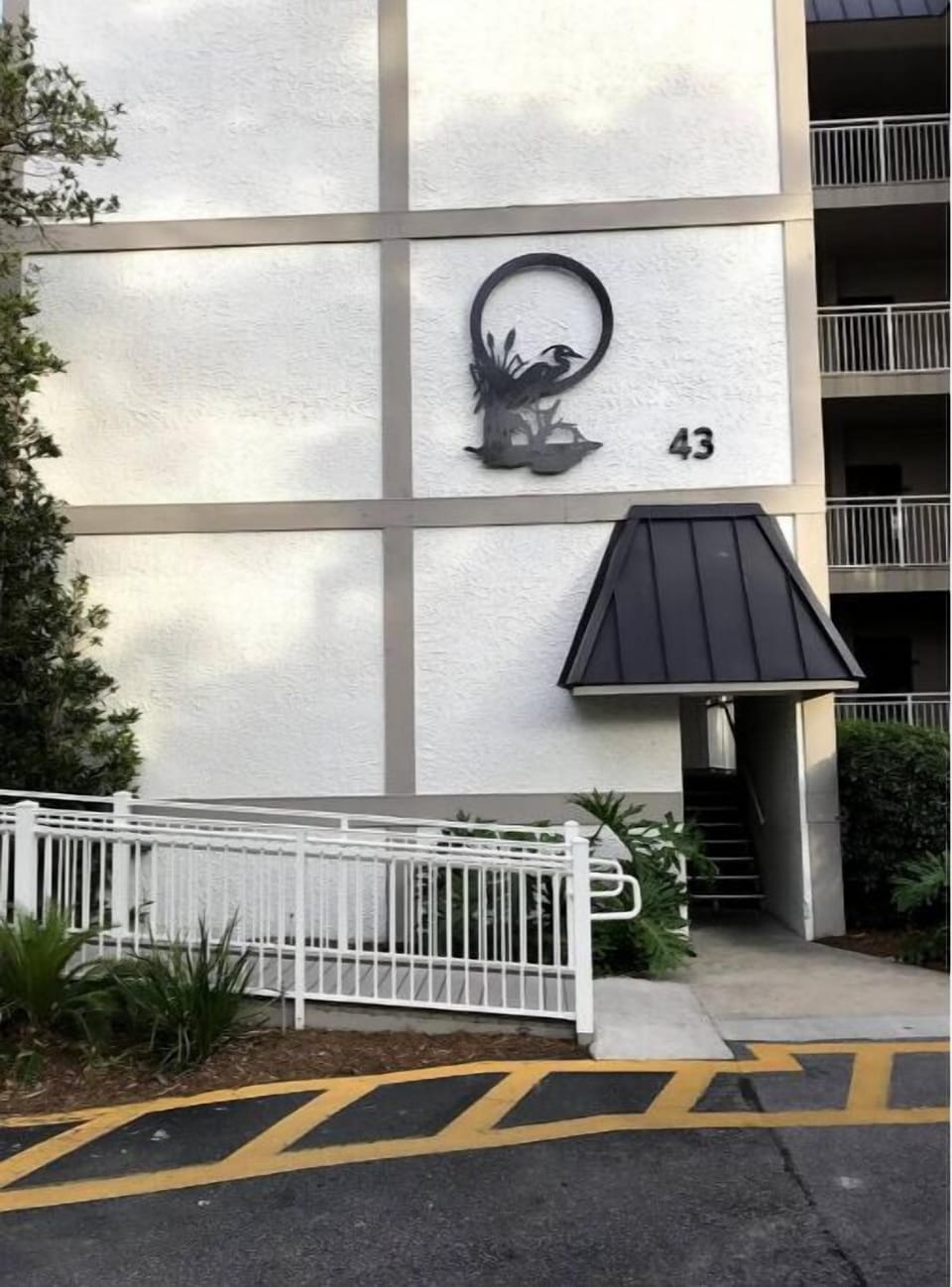 front entrance with elevator and luggage carts
