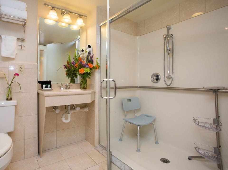 An accessible shower with thoughtful design ensures comfort and ease during your stay.