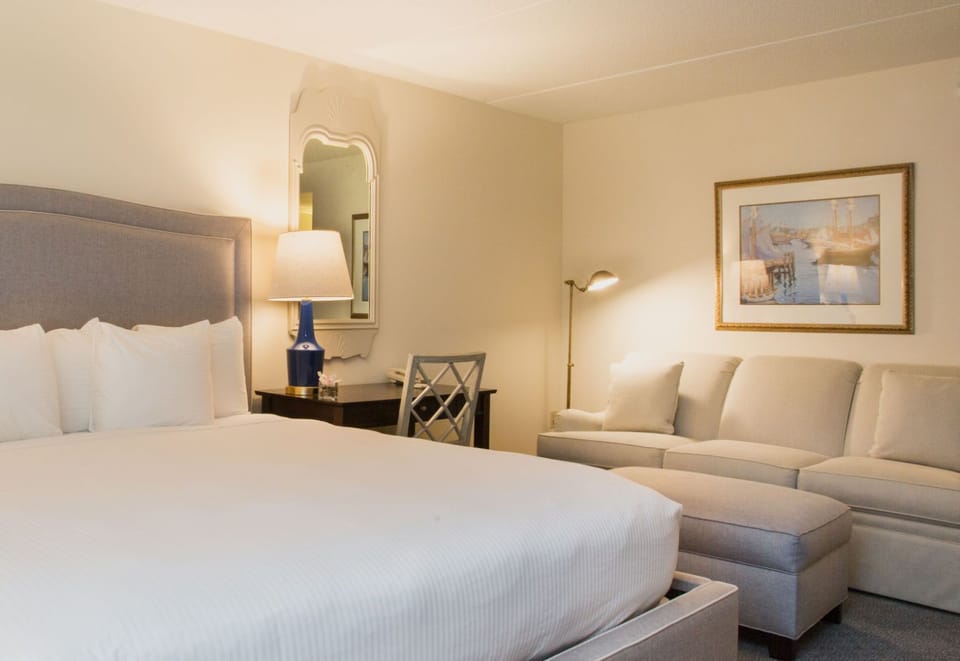 Soft lighting and cozy furnishings create a warm and inviting retreat for restful nights.