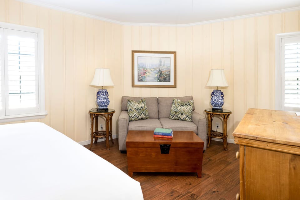 A bright and spacious room with rustic accents, perfect for a relaxing getaway.