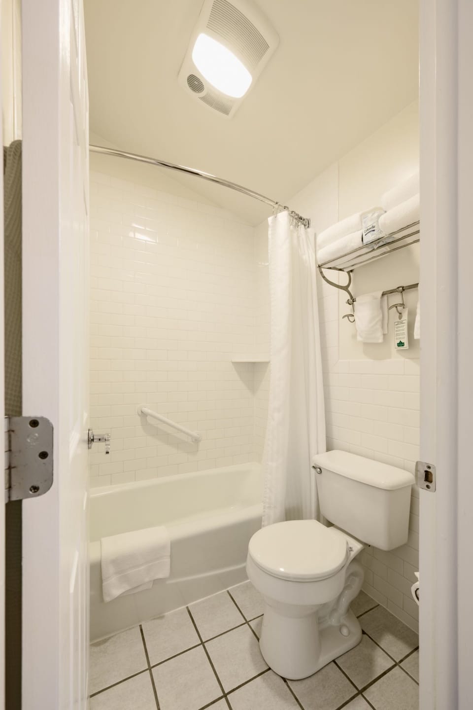 A bright and inviting bathroom with a clean, classic design for a refreshing experience.