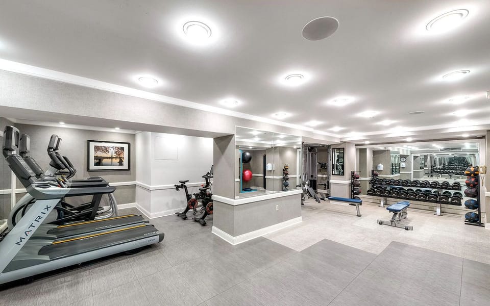 State-of-the-art fitness center, designed for an energizing workout with top-tier equipment and a sleek, modern atmosphere.