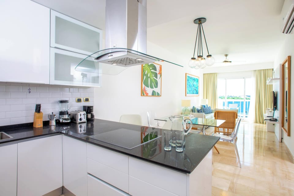 Basic Condo, Balcony, Golf View | Living area | Flat-screen TV
