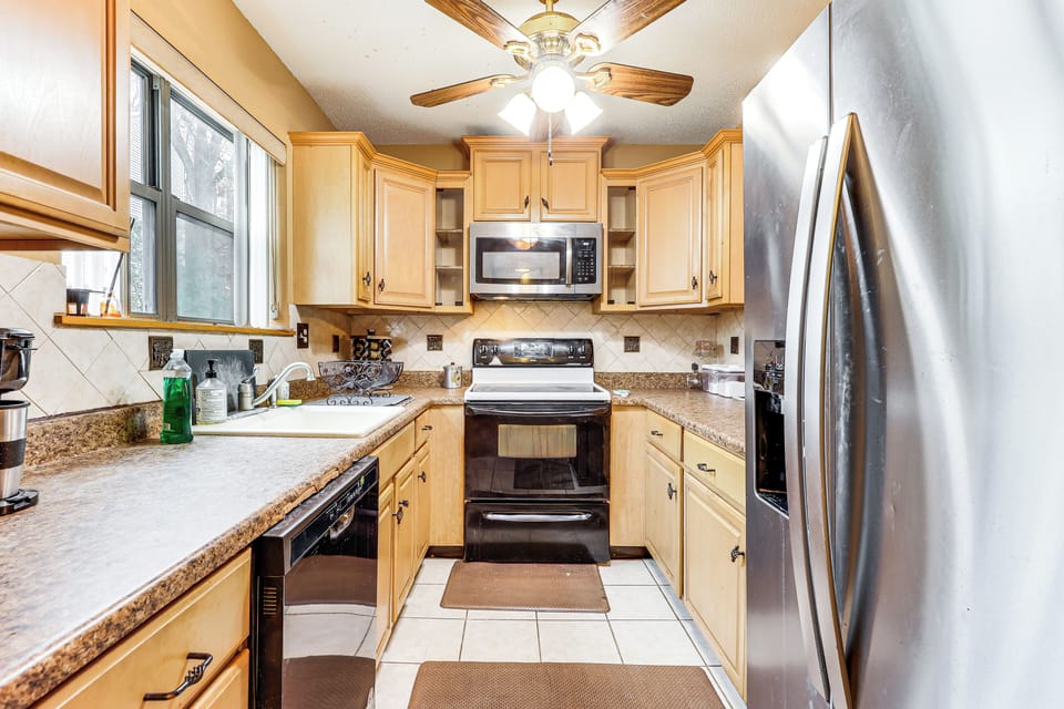 Kitchen | 3-Story Condo | Free WiFi | Central Heating | Window A/C Units