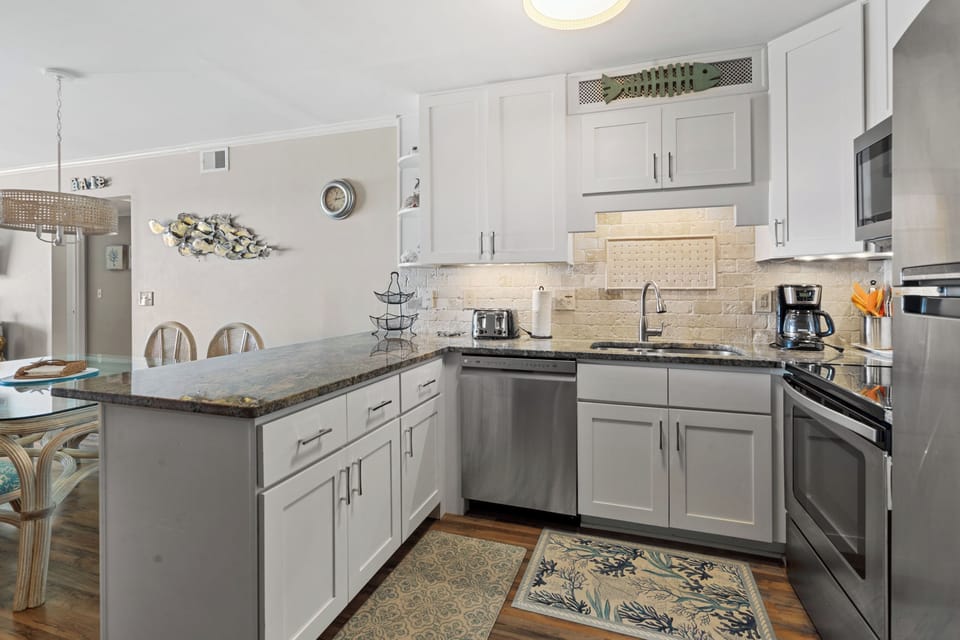 Condo, Multiple Beds, Pool Access, Ocean View (Sea Cloisters 201E) | Private kitchen | Coffee/tea maker