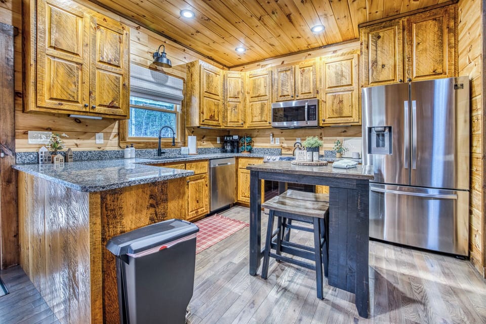 Create tasty cabin meals in a kitchen w/ granite counters & full appliances.