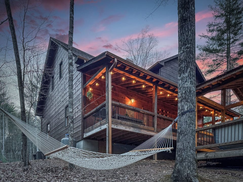 Lounge under string lights or sway in a hammock with peaceful woodland views!