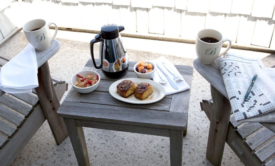 Start your day with a peaceful breakfast on the balcony, complete with fresh coffee and pastries.