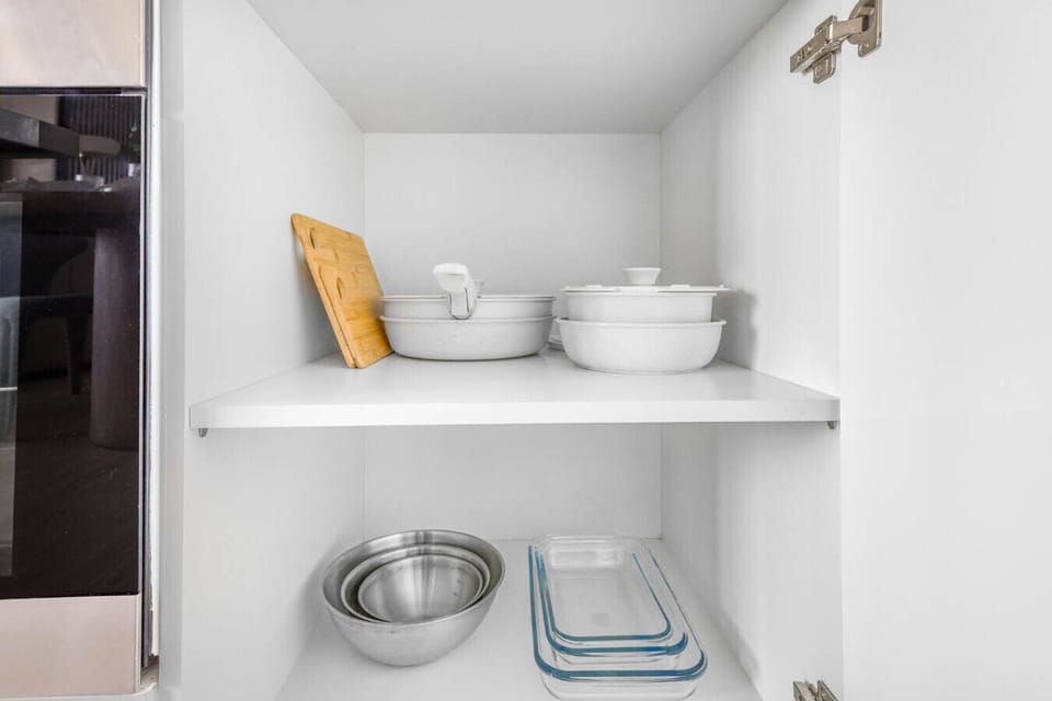 A neatly arranged set of plates and cups, ready for your dining needs.