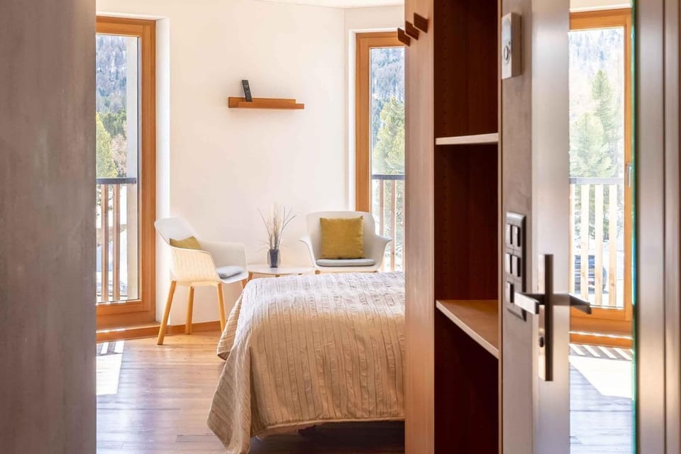 Basic Double Room, Mountain View | Minibar, in-room safe, blackout drapes, soundproofing