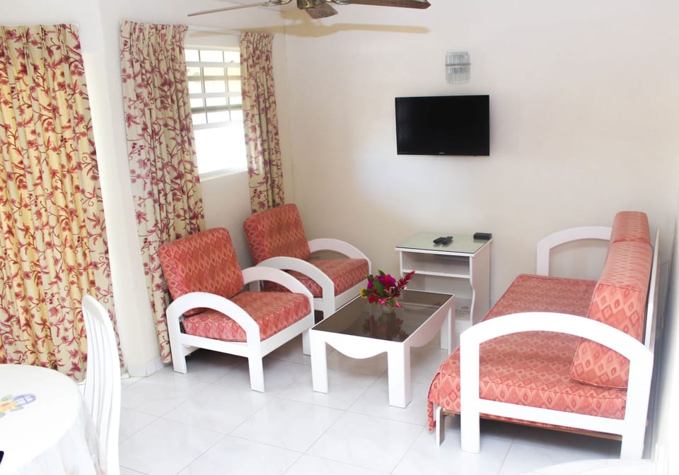 Apartment, 1 Bedroom | Living area | Flat-screen TV