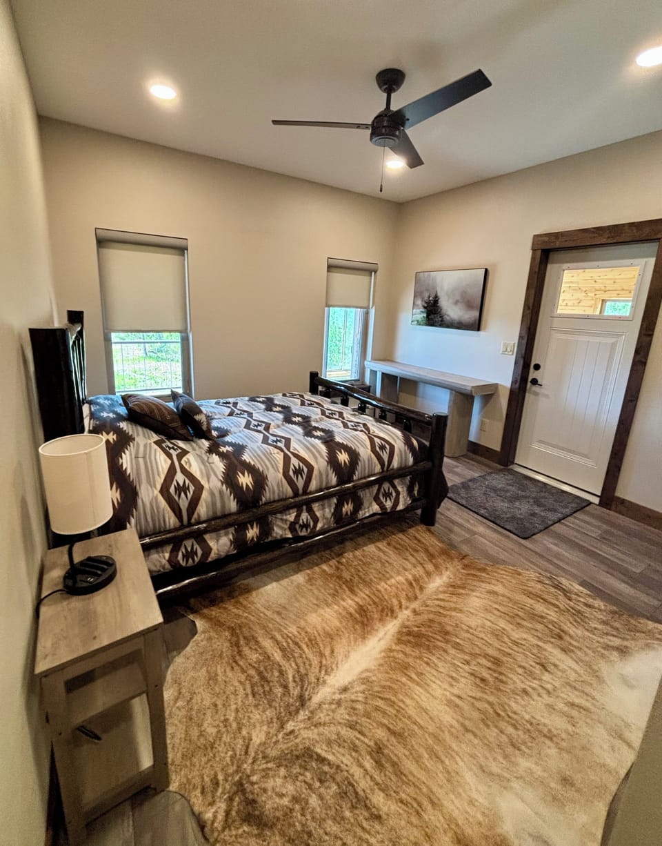 Main Level-en-suite bedroom w/direct access to hot tub room.