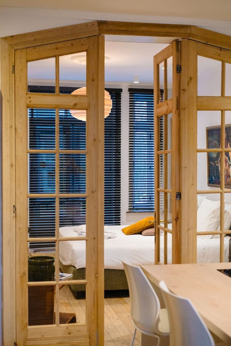 Spacious suite with dining table and connected rooms