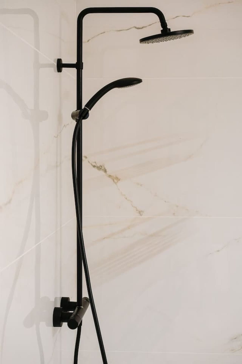Modern bathroom with rain shower and toilet