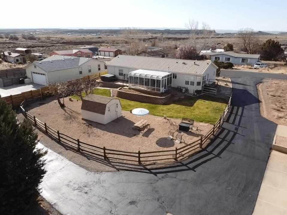 Aerial View of the Private Backyard at Mirambeena Getaway. Enjoy the covered sunroom, the fire pit, the hot tub, or the back lawn!