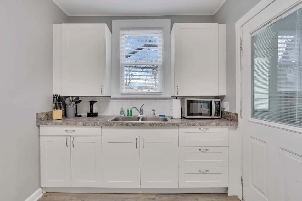 Brand new kitchen with stainless steel appliances and all the modern essentials
