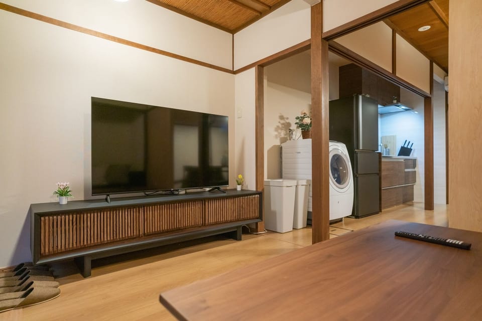 Classic House, Balcony | Living area | 50-inch TV with satellite channels