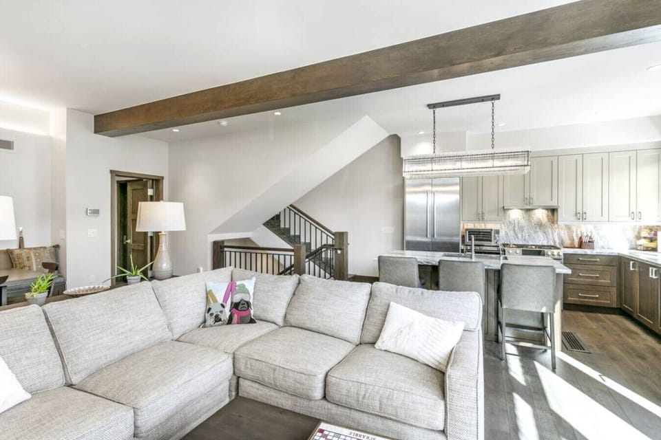 Spacious Living Room with Comfy Seating, Spectacular Floor to Ceiling Views, Gas Fireplace and Large Smart TV