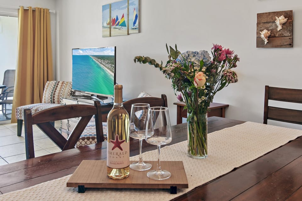 Gather for meals at the dining table with coastal touches.