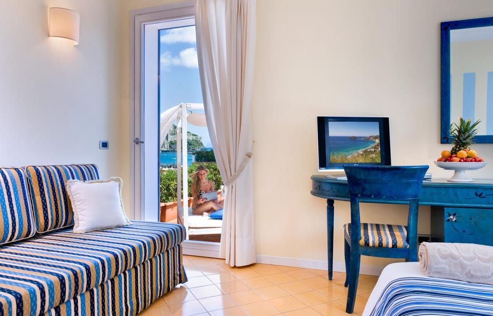 Deluxe Double or Twin Room, Terrace, Sea View | Minibar, in-room safe, desk, soundproofing