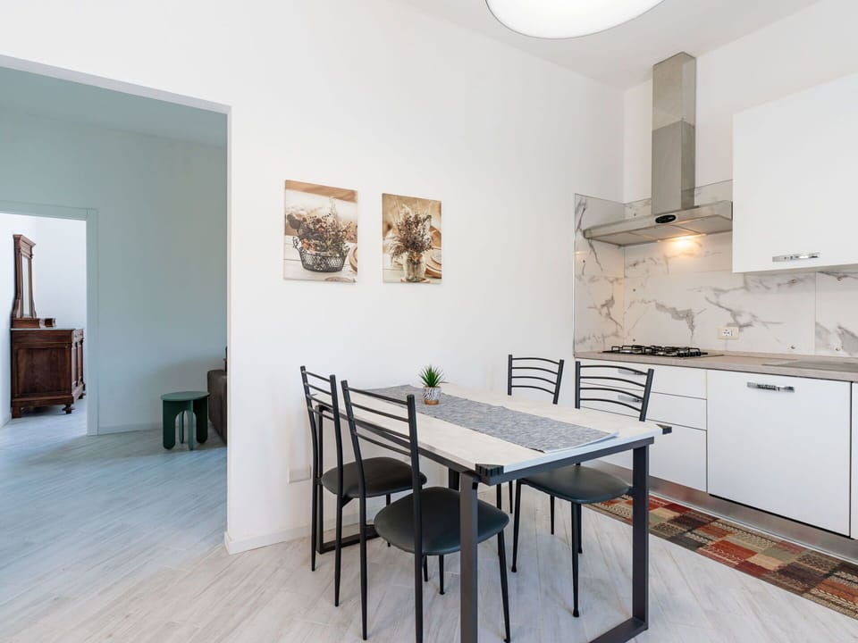 Furniture, Wood, Interior Design, Flooring, Kitchen, Cabinetry, Floor, Room, Major Appliance, Cupboard