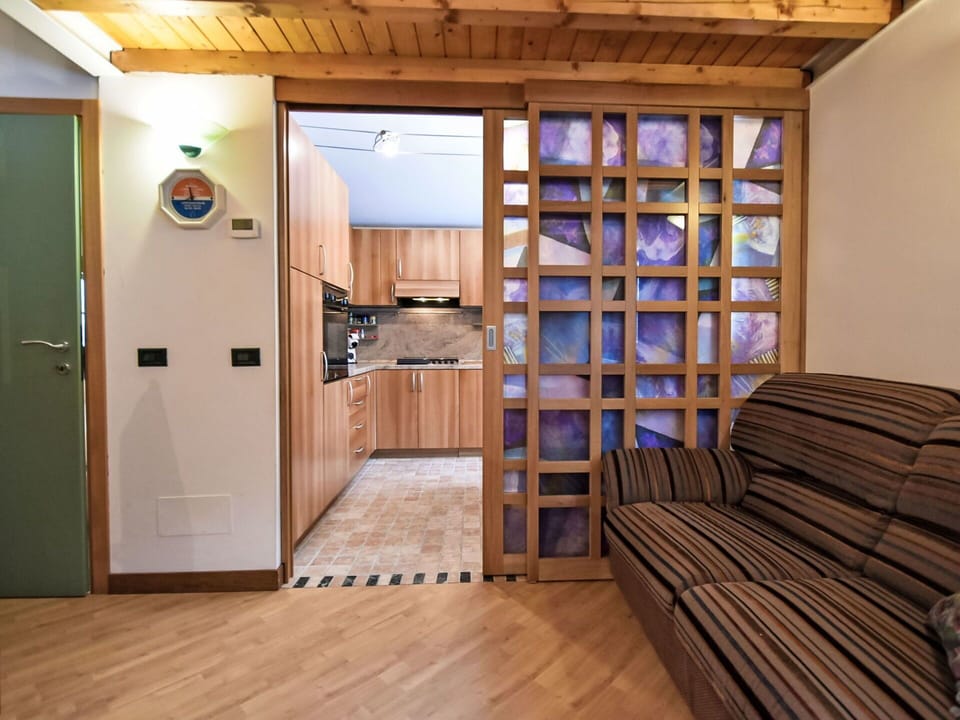 Furniture, Wood, Interior Design, Flooring, Kitchen, Cabinetry, Floor, Room, Major Appliance, Cupboard