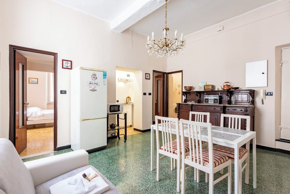Apartment, 2 Bedrooms | Living area | 32-inch flat-screen TV with cable channels