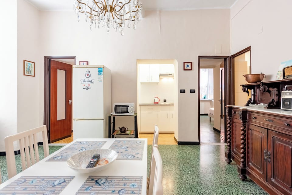 Apartment, 2 Bedrooms | Living area | 32-inch flat-screen TV with cable channels
