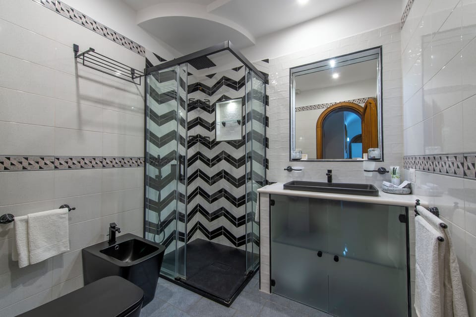 Shower, hair dryer, bathrobes, slippers