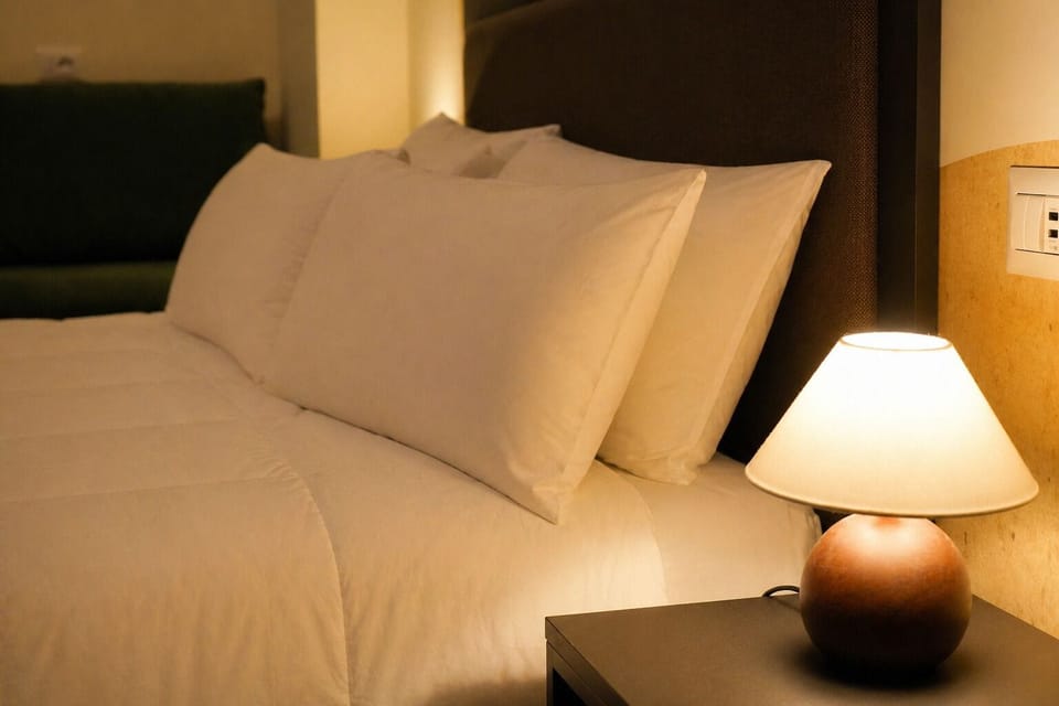 Quadruple Room, Private Bathroom | Free minibar, in-room safe, desk, laptop workspace