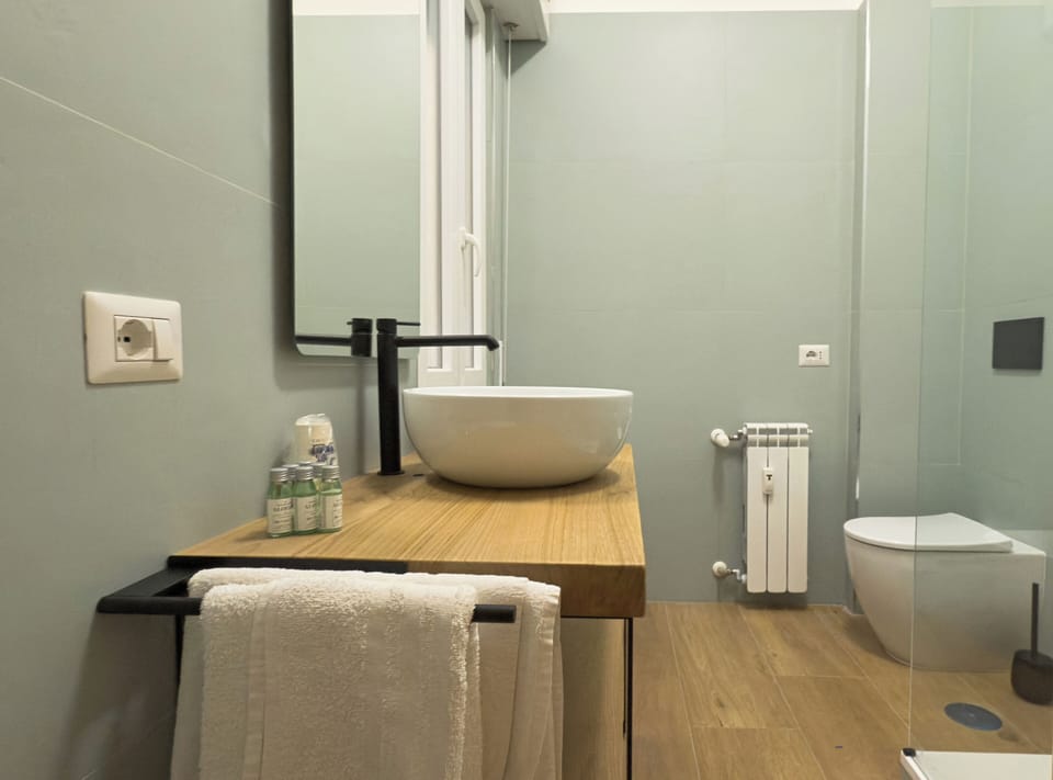 Quadruple Room, Private Bathroom | Bathroom | Shower, hair dryer, towels, soap