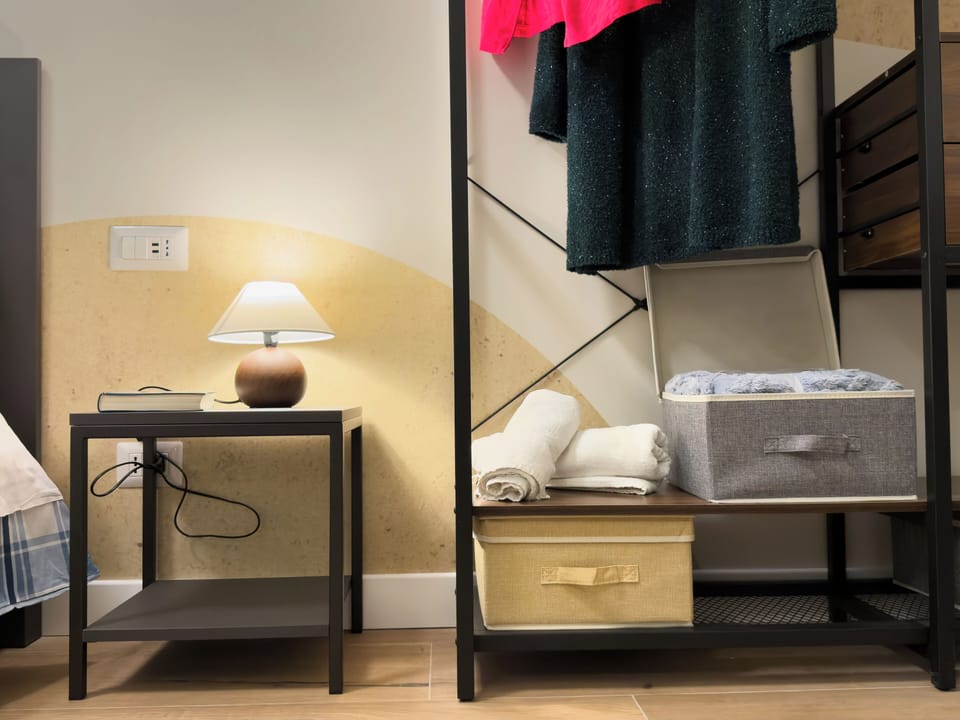 Quadruple Room, Private Bathroom | Minibar (free items), in-room safe, desk, laptop workspace