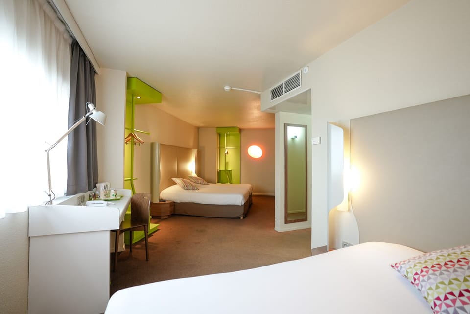 Standard Room, Multiple Beds | Premium bedding, desk, laptop workspace, blackout drapes