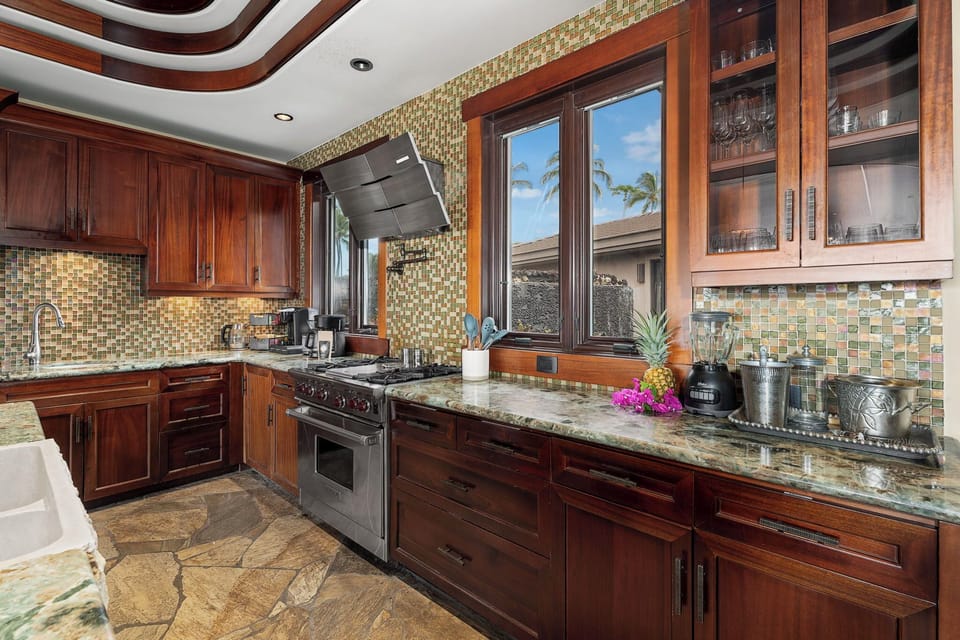 Entertain effortlessly in the spacious kitchen with premium appliances and island seating.