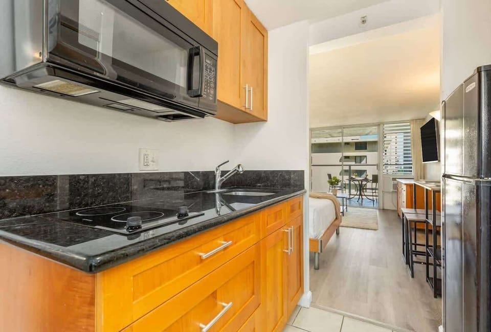 Apartment (1 Bedroom) | Private kitchen | Fridge, microwave, oven, stovetop