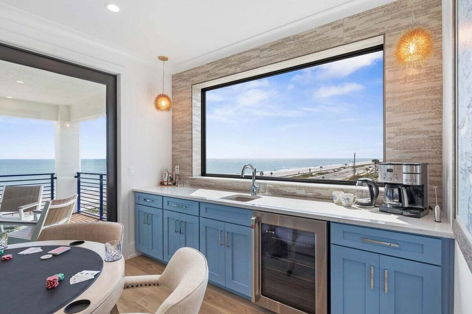 Wet bar & card table with ocean views, perfect for mixing your evening cocktails or preparing your morning coffee, with a beverage cooler to top it all off!