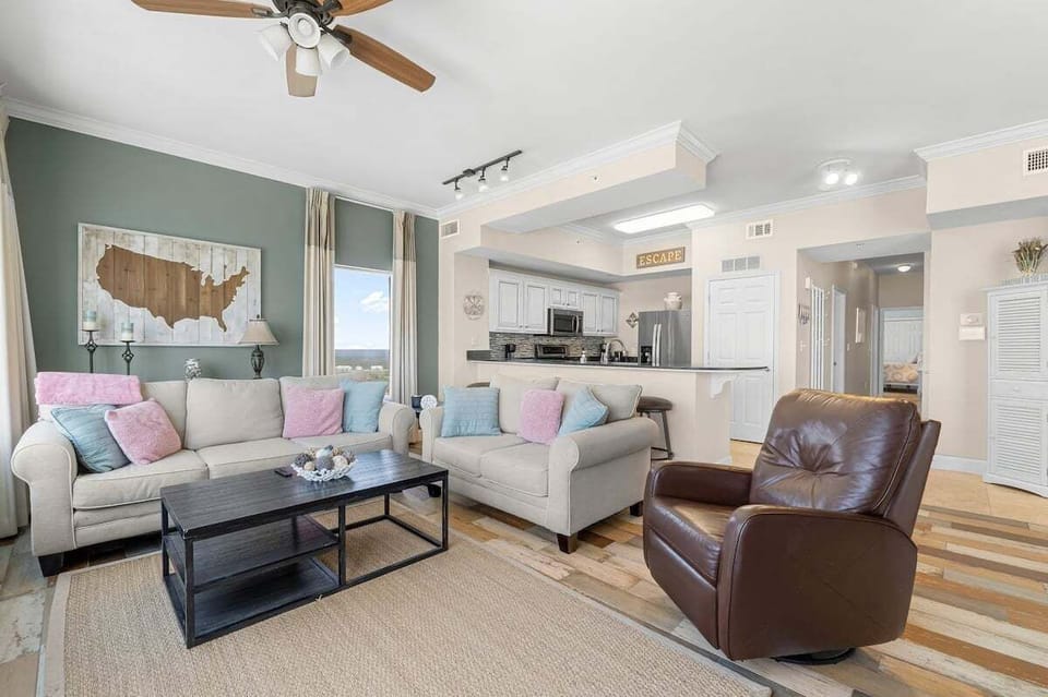 Inside, the spacious and inviting living area is designed for relaxation. Sink into the plush seating, unwind with your favorite show on the large-screen TV.