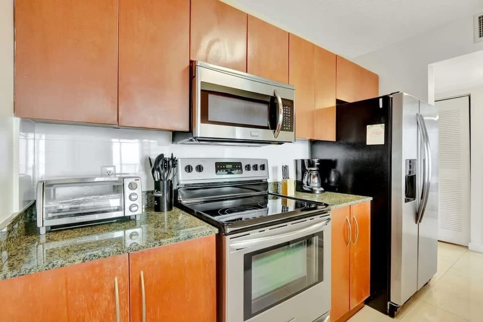Fully equipped kitchen with complete set of cookware